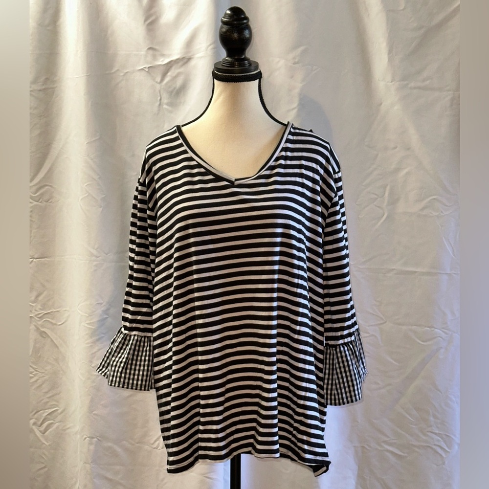 Beautiful striped shirt with plaid detail on sleeve
